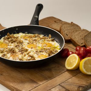 Eggs with barrel Kefalonian cheese